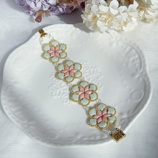 handmade Czech glass beaded bracelet with floral pattern in soft mint green and pink botanical jewelry