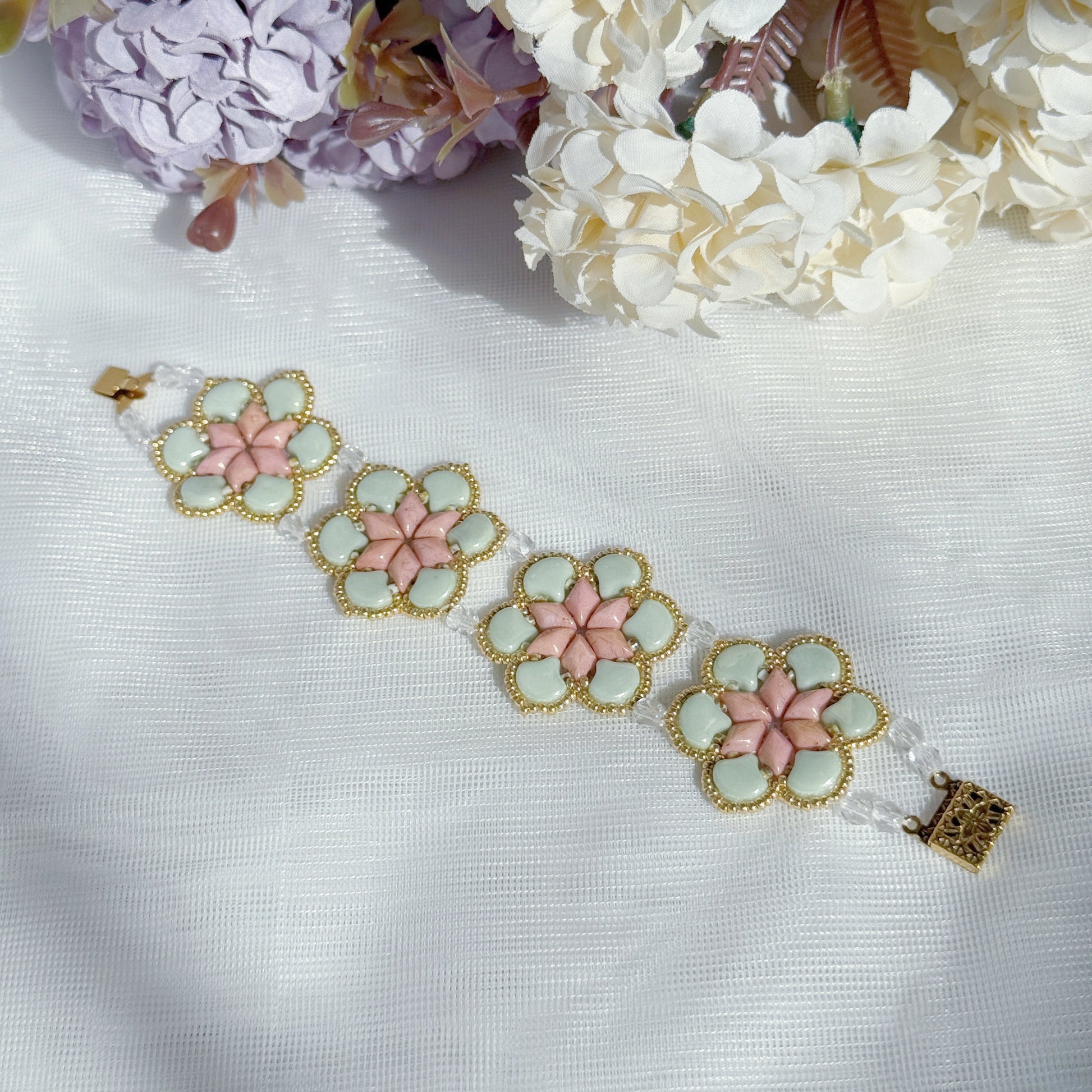 handmade Czech glass beaded bracelet with floral pattern in soft mint green and pink botanical jewelry