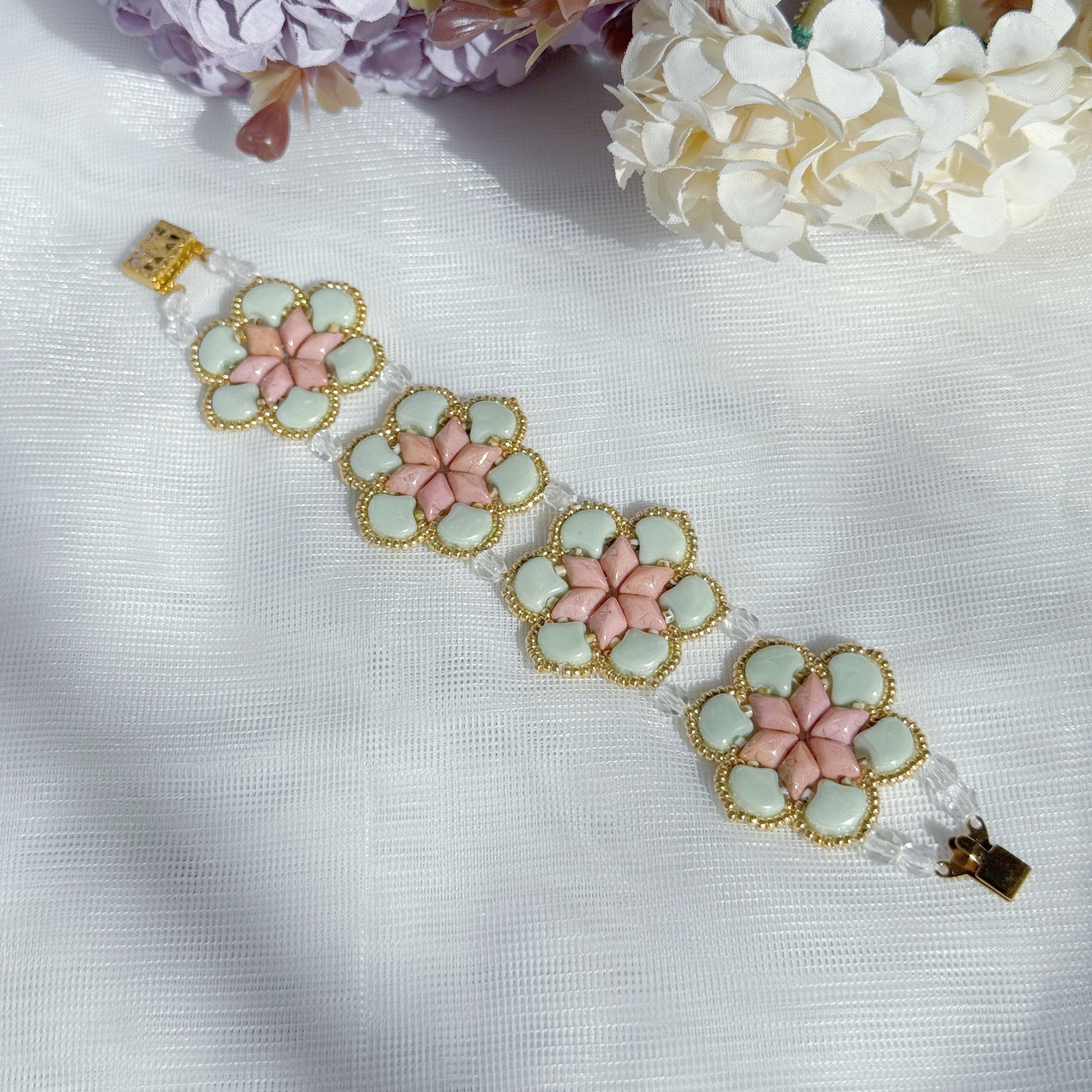 handmade Czech glass beaded bracelet with floral pattern in soft mint green and pink botanical jewelry