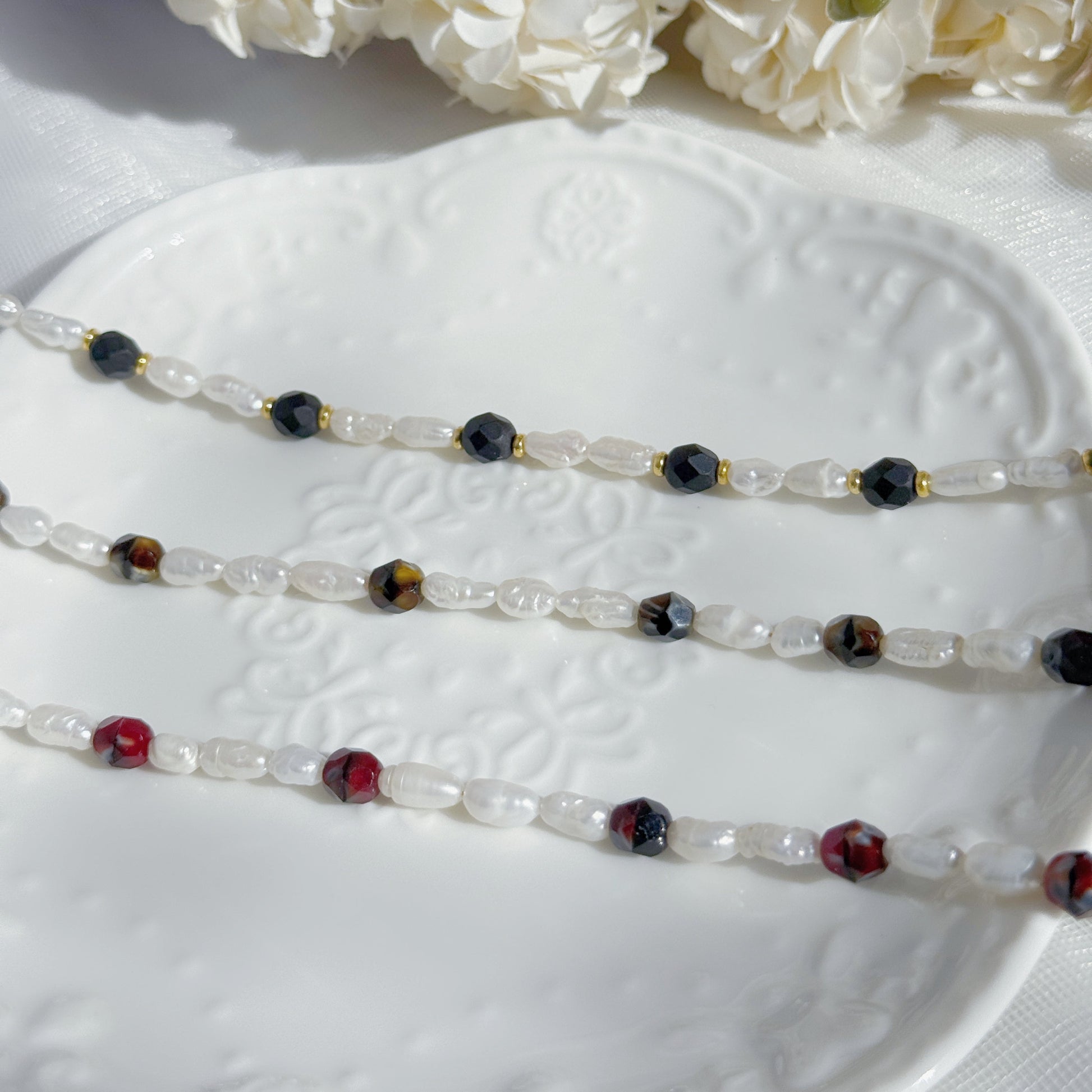 baroque pearl beaded bracelet with czech glass fire polished beads in black red and neutral tones handmade jewelry