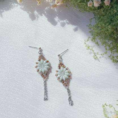 handmade czech glass floral earrings with beaded design and delicate chain dangle in soft mint tones