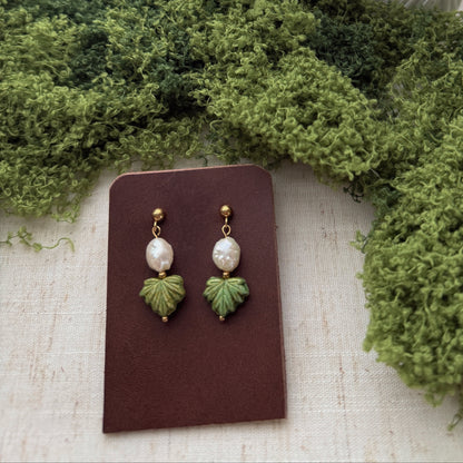 handmade earrings featuring green maple leaf beads and freshwaterpearls