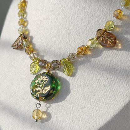 Handmade botanical Czech glass pendant necklace with leaf beads and green floral pendant